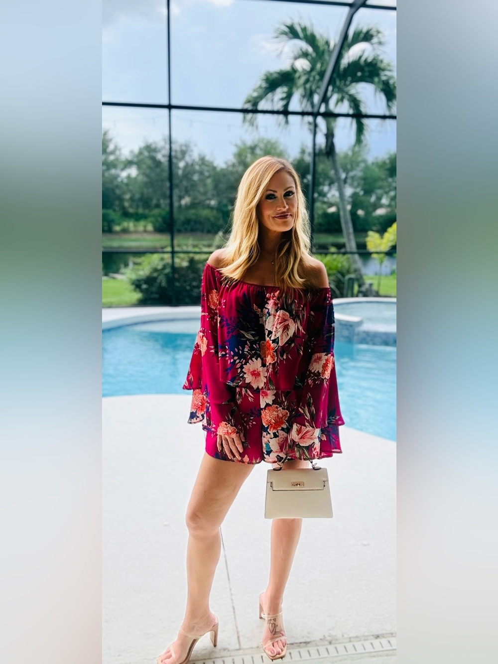 Allie” floral off -the -shoulder romper. Pink lily | vibrant fuchsia pink.